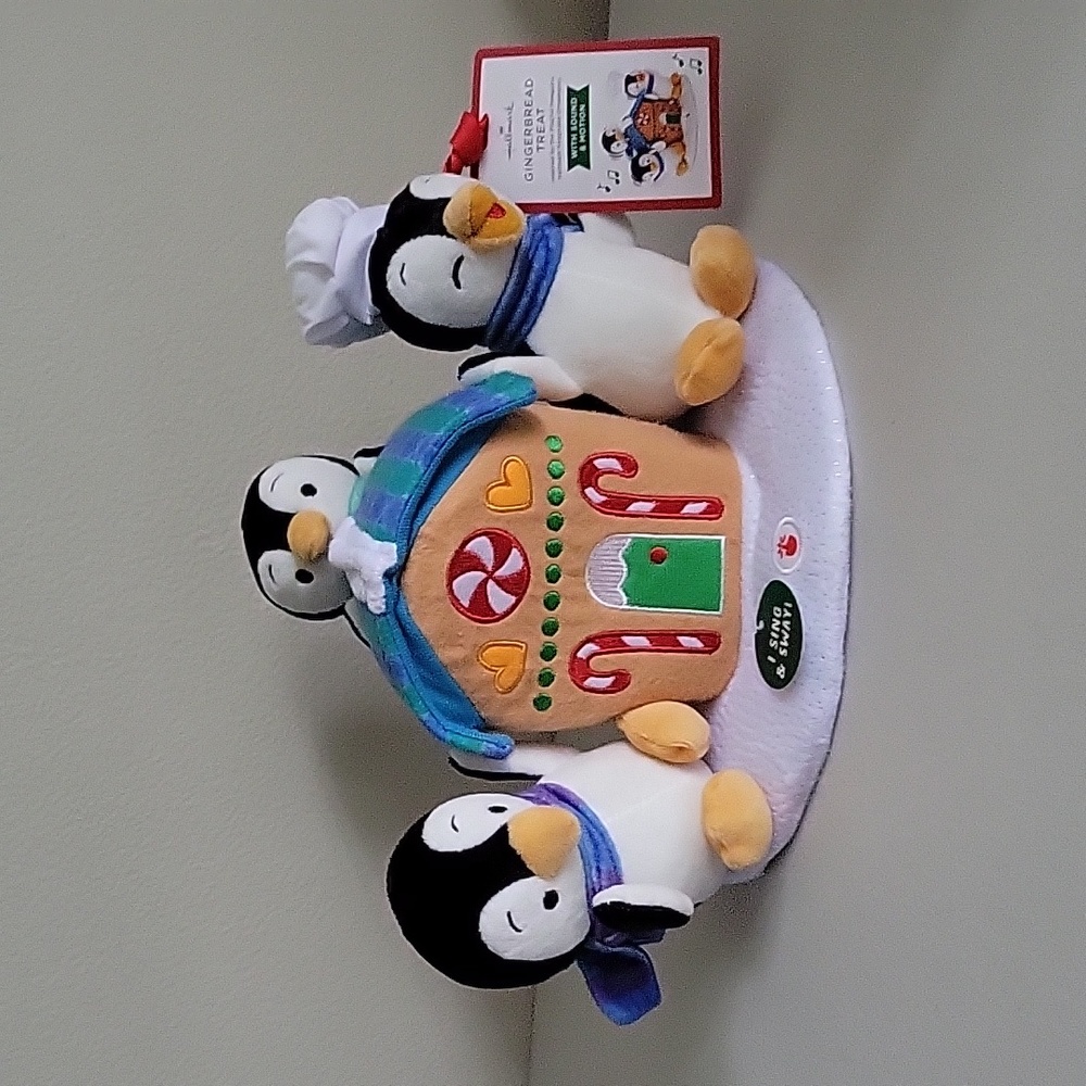 Hallmark gingerbread treat with Penguins sound and motion new with a new book